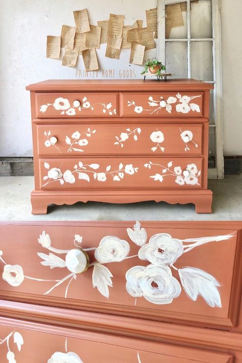 I think Abbey might just be the queen of mixing paint colors! 👑 For this pretty dresser, she combined Fresh Mustard, Devotion, Peachy Keen, and just a hint of Starstruck. Isn't the color lovely? Do you have any color recipes to share? Project by Painted Home Goods Mural On Dresser, Flower Dresser Painted, Floral Painted Dresser, Hand Painted Dressers Diy, Painted Dresser Nursery, Painting Drawers, Paint Dresser Diy, Pretty Dresser, Dresser Remodel