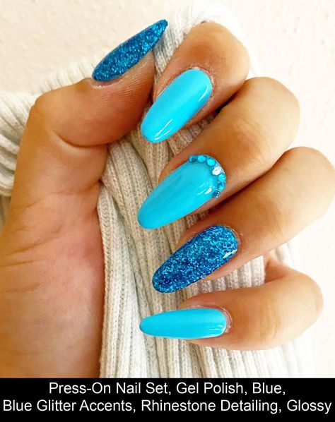 A gel polish, press-on nails set complete with blue color, blue glitter accents, and rhinestone detailing. Nail glue included in every purchase. #blue #nail #design #ideas Blue Glitter Summer Nails, Bright Blue Gel Nails, Aqua Glitter Nails, Beach Summer Nails, Neon Blue Nails, Summertime Nails, Glitter Gel Nail Designs, Glitter Toe Nails, Birthday Nail Designs