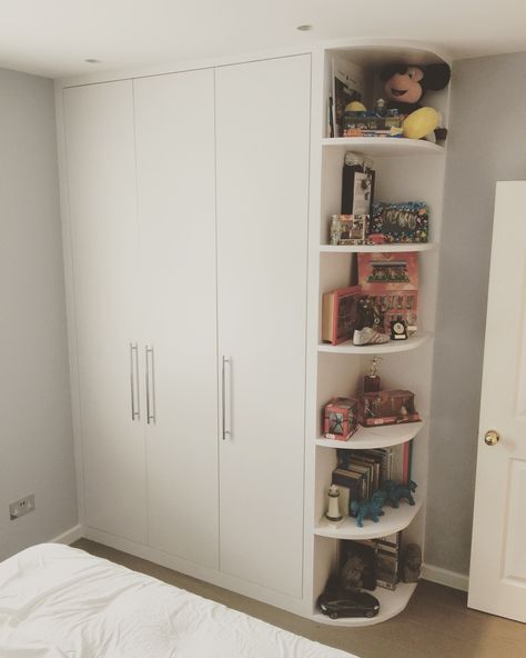 Fitted wardrobe with open shelves. Supplied and fitted by Art Carpentry in Chiswick, London. #fittedwardrobes #fittedwardrobe #fittedfurniture #bespokefurniture #bespokewardrobes #veneer #oakveneer #walnutveneer #builtin #builtinwardrobe #artcarpentry Wardrobe Open Shelves, Shelf Cabinet Bedroom, Small Inbuilt Wardrobe Ideas, Wardrobe With Open Shelves On Side, Box Room Fitted Wardrobes, Side Of Wardrobe Ideas, Wardrobe With Bookshelves, Built In Wardrobe Ideas Small Bedroom, Wardrobe With Side Storage