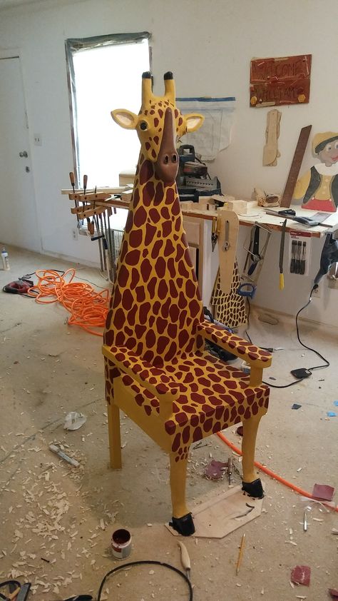 A solid wood giraffe chair that i created.#handcraftedgiraffechair#happykidztoyboxes#giraffe Giraffe Room Ideas, Giraffe Home Decor, Giraffe Chair, Giraffe Print Decor, Giraffe Bookshelf, Animal Chair, Giraffe Sculptures & Statues, Giraffe Decor, Giraffe Pictures