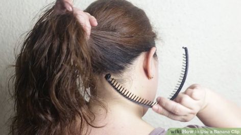 3 Ways to Use a Banana Clip - wikiHow How To Style Banana Clips, How To Put Your Hair Up In A Banana Clip, Banana Clip Faux Hawk, How To Style Hair With Banana Clip, Banana Clip Hairstyles Long Hair, How To Wear Banana Clip, Banana Comb Hairstyles, Hairstyles With Banana Clips, Banana Clip Hairstyles Short Hair