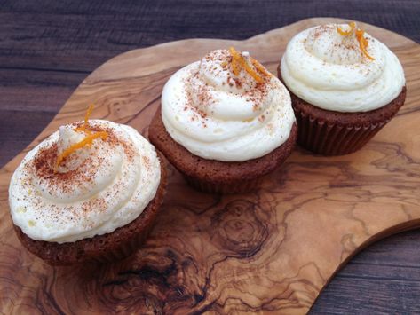 Orange spice cupcakes with citrus buttercream frosting Orange Spice Cupcakes, Autumn Feast, Orange Frosting, Orange Juice Concentrate, Cupcake Pans, Spice Cupcakes, Holiday Guide, Cream Frosting, Orange Spice