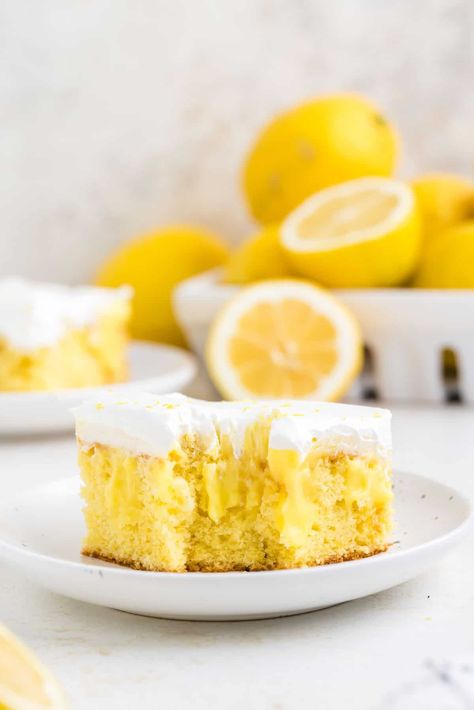 Lemon Poke Cake is a sweety and tangy dessert recipe made with boxed lemon cake mix, lemon instant pudding mix and Cool Whip. Marshmallow Poke Cake, Pineapple Poke Cake, Poke Cake Lemon, Lemon Pudding Cake, Moist Lemon Cake, Cake Lemon, Lemon Dessert, Lemon Cake Mixes, Lemon Cake Recipe