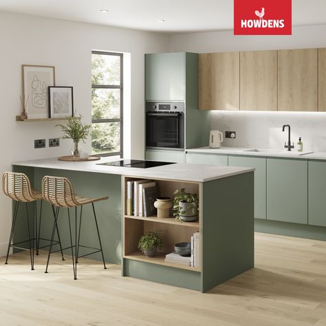 Looking for two tone kitchen cabinets or a two tone kitchen design? Pair our Howdens Clerkenwell Super Matt Reed Green Kitchen and Howdens Greenwich Natural Oak Kitchen to create a modern kitchen design. The contrast between the green kitchen cabinets and oak kitchen cabinets will add colour to your contemporary kitchen design. Pair your green kitchen inspiration with kitchen breakfast bar ideas to utilise space. Finish with a grey marble worktop kitchen to create a luxury look in any home. Natural Oak Kitchen, Howdens Clerkenwell, Green Kitchen Inspiration, Howdens Kitchens, Two Tone Kitchen Cabinets, Trend Ideas, Two Tone Kitchen, Green Kitchen Cabinets, Oak Kitchen Cabinets