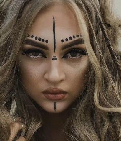 Wolf Woman Aesthetic, Warrior Paint Face, Viking Body Painting, Viking Eyeliner, Diy Viking Makeup Woman, Viking Cosplay Female Makeup, Viking Princess Makeup, Assassin Makeup Female, High Priestess Makeup