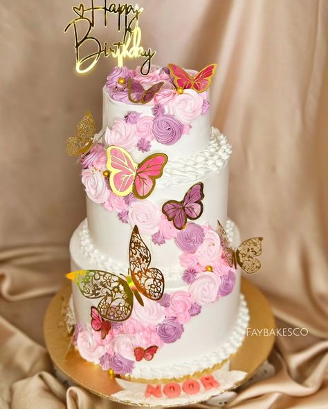 Noor's birthday with this beautiful three-tier cake, swirls & butterflies 🦋 💗 A sweet treat for a sweet little one! #faybakesco #faybakescobyfaiza #malakwal #cakes #homebaking #Pinterest #Birthday #Birthdaycake #customcake #celebrationcake Birthday Cake Three Tier, Three Tier Cake Birthday, Butterfly Theme Cake, Personality Board, Cartoon Birthday Cake, 21st Ideas, Tiered Cakes Birthday, Three Tier Cake, Cartoon Birthday