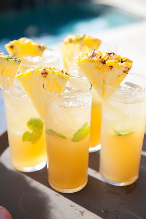 Keep your cocktails light and fresh to go with your Summer theme. Vibrant hues like yellow will remind everyone of tropical getaways. Pineapple Cocktail, Perfect Summer Drink, Colorful Cocktails, Signature Drinks, Wedding Cocktails, Signature Cocktail, Bar Drinks, Adult Drinks, Tropical Wedding