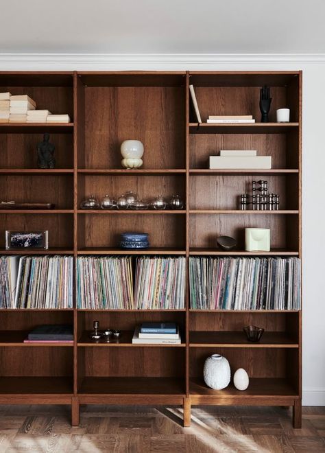 Mid Tone Wall Colors, Mcm Built In Bookcase, Hallway Bookcase Ideas, Wooden Bookshelves In Living Room, Dark Wood Built Ins, Wabi Sabi Bookshelf, Wood Built Ins Living Room, Record Bookshelf, Mid Century Built Ins