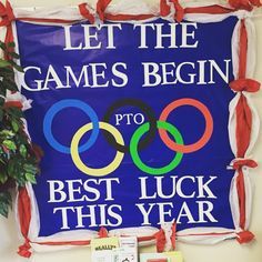 Olympic theme back to school bulletin board Olympic Bulletin Board, Pto Bulletin Board, Pe Bulletin Boards, Olympic Idea, Olympics Activities, Olympic Theme, School Door Decorations, Library Bulletin Boards, Let The Games Begin