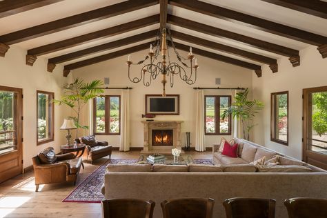 Source Tuscan Family Room, Spanish Eclectic Home, Spanish Mediterranean Homes Interior, Mediterranean Home Interior Design, Spanish Home Design, Mediterranean Family Room, Spanish Mediterranean Homes, Modern Mediterranean Home, Built In Around Fireplace