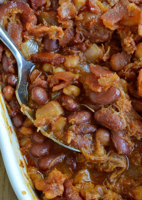 The pulled pork and bacon in this Double Pork Baked Beans Recipe makes it perfect as a side dish or dinner! Homemade pork and beans is super easy and delicious. This dish is great for feeding a hungry crowd! Pulled Pork Side Dishes, Pork And Beans Recipe, Pork Side Dishes, Cowboy Baked Beans, Pork And Beans, Best Baked Beans, Bbq Beans, Baked Beans Recipe, Homemade Baked Beans