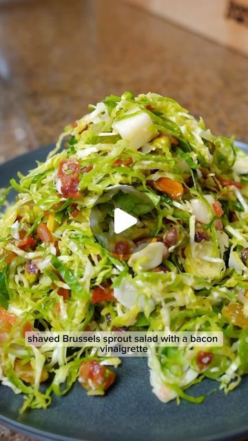 Kelly Scott on Instagram: "How to make a warm Brussels sprout salad with bacon vinaigrette 🥓 ⬇️

Follow @kellyscleankitchen for more recipes!

Comment “RECIPE” to get this straight to your DMs or see the below recipe!

When it comes to salads I don’t mess around! I am a huge salad lover, but only if it is hearty, packed with varying flavors, and tons of great textures. This warm brussels sprout salad with bacon vinaigrette ticks all of those boxes. If you are a fan of brussels and bacon, you are going to be obsessed with this salad!

Recipe ⬇️

Ingredients:
* 
* 1/2 lb bacon, thinly sliced
* Vinaigrette:
 * Fat from cooking the bacon
 * 1 shallot, minced
 * 3-5 garlic cloves, minced
 * 1 tbsp maple syrup
 * 1 tbsp dijon mustard
 * 1/2 lemon, juiced
 * salt and pepper
* 20 oz brussels spro Brussel Sprout Slaw, Bacon Vinaigrette, Brussel Sprout Salad Recipes, Brussels Sprout Salad, Sprout Salad, Sprouts Salad, Brussels Sprout, Brussel Sprout Salad, More Recipes