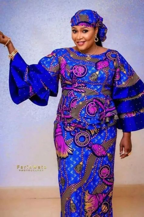 Hello beautiful ladies, Today i have brought you Latest, Matured and Beautiful ankara long gown styles that can be rocked to all occasion . When was the last time you rocked an Ankara fabric? As simple as the fabric may be, it can be a game changer in your fashion sense. The fact that we always want to be creative with what we wear simply means that we can make Ankara look extraordinary on us. Visit our page for more styles A Shape Gown Ankara, Sleeve Tutorial, Long Gown Styles, Ankara Long Gown, Ankara Long Gown Styles, African Fabric Dress, Short African Dresses, Ankara Gown, Ankara Gown Styles