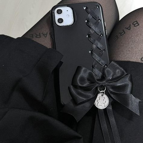 Coquete Lace Up Bow Black Phone Case ON1497 Experience the perfect blend of cuteness and style with our Kawaii Coquete Lace Up Bow Black Phone Case! This adorable phone case features a kawaii-inspired design with a delightful lace-up bow detail. The sleek black color adds sophistication to your phone while the cute bow adds a touch of playfulness. Crafted with high-quality materials, this phone case offers reliable protection against daily wear and tear, keeping your device safe and secure. Elev Goth Phone Case, Lace Phone Case, Black Kawaii, Kawaii Store, Harajuku Girls, Girly Phone Cases, Girl Phone Cases, Gothic Accessories, Ballet Fashion