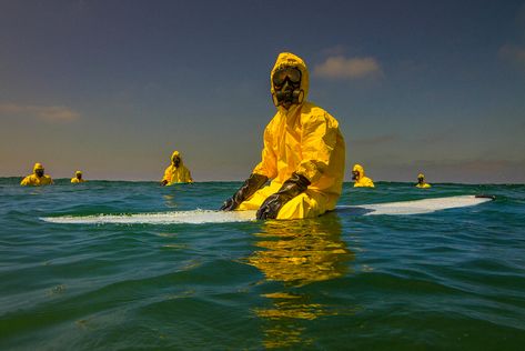 the dismal lives of these heavily-cloaked future beach-goers brings to light a raw view of the potentially poisonous environment we could be setting ourselves up for. Los Angeles Beach, Surfrider Foundation, Hazmat Suit, Ocean Pollution, Surfing Photos, Dystopian Future, Photography Series, Surf Style, Surfs Up