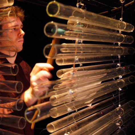 Mathieu Demange plays a glass percussion instrument. Jean-Claude Chapuis, a jazz musician and science historian, created the Glass Orchestra in 1995 to play historical and new instruments based on the acoustic richness of glass Glass Instruments, Theater Major, Tubular Bells, Instrument Design, Installation Ideas, Escape Artist, Percussion Instrument, Music Instrument, Pose References