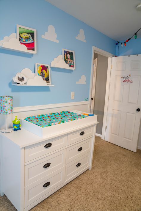 Andy’s Room Nursery, Cloud Shelves Nursery, Subtle Toy Story Nursery, Toy Story Dresser, Unique Baby Boy Nursery Themes, Toy Story Room Ideas For Boys, Toy Story Baby Room, Toy Story Nursery Ideas, Disney Boy Nursery