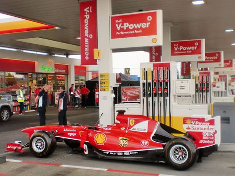 Shell V-Power: Just another day at a Shell station with Sebastian ... Shell Gas Station, Power Logo, Logistics Management, Sports Marketing, Filling Station, Gas Stations, Sebastian Vettel, Shell Station, Ferrari Car