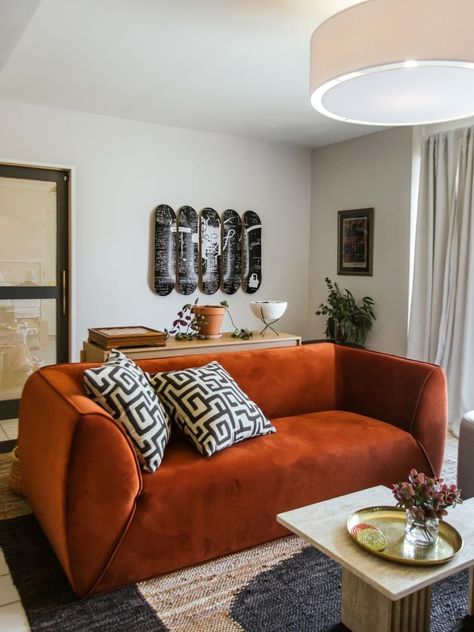 Living Room with Rust-Colored Sofa and Black And White Pillows Rust Sofa, Black Designers, Houses In America, Hgtv Dream Home, Black And White Pillows, Georgia Homes, Water System, Schedule Design, Trendy Home