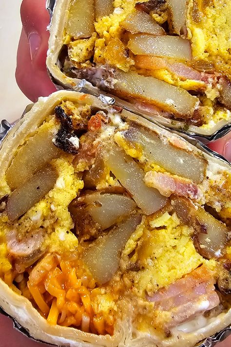 A giant burrito loaded up with potatoes, bacon, ham, egg and cheese! #breakfastburrito #burritos #homemadebreakfastburrito #breakfastfordinner Bacon And Egg Burrito, Potato Egg Cheese Burrito, Ham And Cheese Burritos, Ham Burrito, Breakfast Burritos With Potatoes, Bacon Burrito, Giant Burrito, Potato Burrito, Egg Burrito