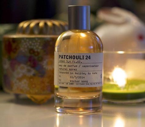 Patchouli 24 by Le Labo reveals the mystery of the esthete's connection with his scent. Renowned perfumer Annick Menardo played one of the defining roles in the creation of this fragrance. Patchouli 24 was added to the Le Labo catalog in 2006. Patchouli became the beginning notes of this fragrance. The middle notes combine birch and styrax, enveloping the connoisseur of Patchouli 24 with a transparent, fragrant aura. Vanilla was established by the author as the basis of the described perfumes. Patchouli Scent, Rosé Wine Bottle, Aura, Wine Bottle, Vanilla, Spray, Fragrance, Conditioner, Quick Saves