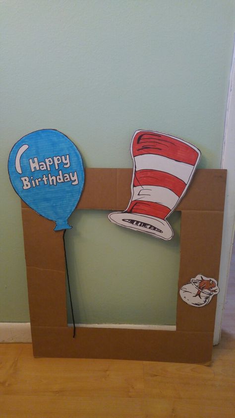 Dr. Seuss birthday photo prop, Cat in the hat picture frame. Dr Seuss Photo Props, Cat In The Hat Backdrop, Happy Birthday Dr Seuss Crafts, London Graduation, Winter Door Decorations Classroom, Cat In The Hat Birthday, Doctor Suess Birthday, Cat In The Hat Party, Dr Seuss Classroom