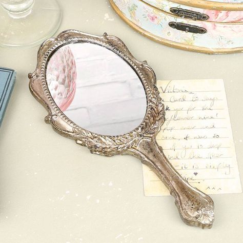 I've just found Hand Mirror. Shabby chic hand held mirror in vintage cream or distressed silver. £16.00 Mirrors Aesthetic, Unusual Mirrors, Antique Vanity Set, Fancy Mirrors, Jasper Hale, Hand Mirrors, Mirror Aesthetic, Fancy Hands, Magic Hands