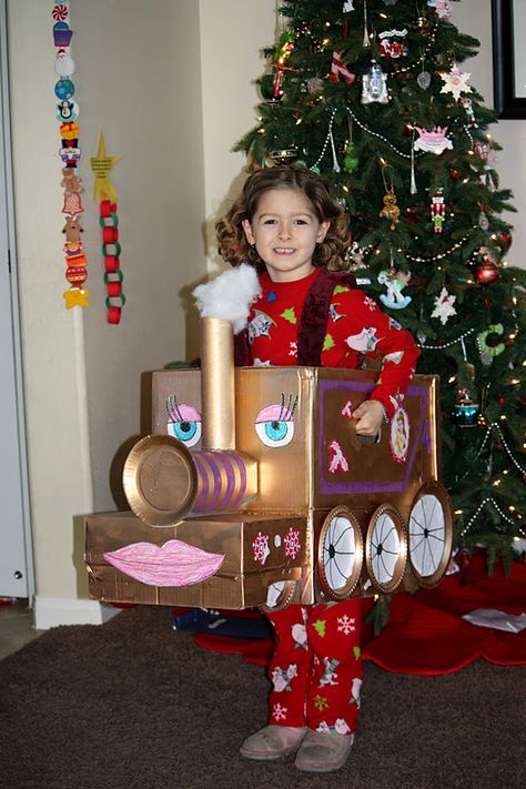 My daughter's homework assignment was to make a Polar Express train car to be used in the school's annual Polar Express Ride.  I wanted my ... Polar Express Box Car Parade, Polar Express Cardboard Train Boxes, Polar Express Box Train Ideas, Polar Express Train Cardboard Parade, Diy Polar Express Train Cardboard Boxes, Polar Express Box Car Ideas, Polar Express Train Box Car Ideas, Diy Polar Express Train, Polar Express Train Cardboard