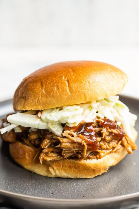 This easy, set it and forget it Slow Cooker Pulled Pork comes out so tender and juicy, made from scratch with my homemade BBQ sauce.  #pulledpork #slowcooker #crockpot #dinner #summerrecipes Easy Pulled Pork Slow Cooker, Sandwich Healthy, Bbq Pulled Pork Sandwiches, Slow Cooker Recipes Pork, Slow Cooker Bbq, Slow Cooker Pulled Pork, Pork Sandwich, Bbq Sauce Homemade, Homemade Bbq