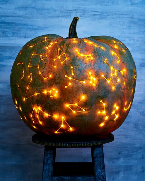 The Galaxy Pumpkin Trend That's Out of This World | Deciding how to decorate your pumpkins can be difficult-there's so many options! This constellation pumpkin will wow the trick-or-treaters at your doorstep. Look to the stars for decorating inspiration!    #halloween #pumpkins #marthastewart #pumpkincarving Halloween Pumpkin Stencils, Creative Pumpkin Carving, Pumpkin Carving Designs, Beautiful Pumpkins, Easy Halloween Decorations, Jack O'lantern, Creative Pumpkins, Pumpkin Stencil, Halloween Pumpkins Carvings