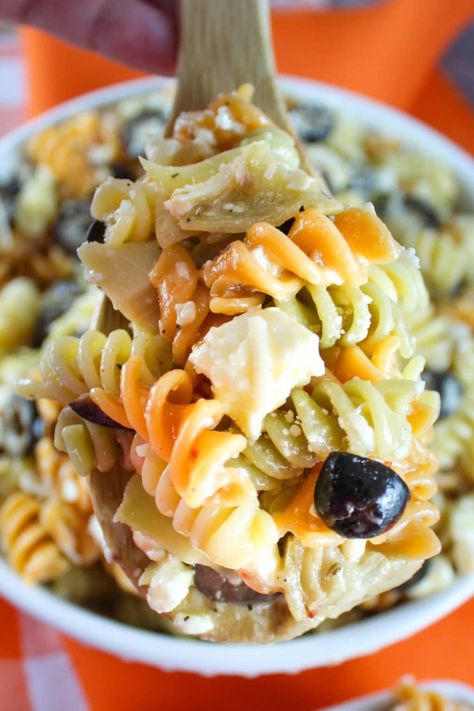 Chicken Salad Chick Pasta Salad is an easy-to-make, potluck-perfect pasta salad! Tri-color rotini pasta tossed with Italian dressing, feta & parmesan cheese, black olives & artichoke hearts. Chicken Salad Chick Recipe, Tri Color Pasta Salad, Rotini Pasta Recipes, Chicken Salad Chick, Tri Color Pasta, Homemade Chicken Salads, Delicious Chicken Salad, Rotisserie Chicken Breast, Chicke Recipes