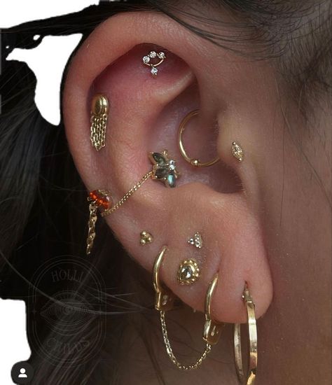 Staggered Ear Piercings, Pretty Pierced Ears, Mixed Metals Piercings, Ear Piercing Ideas Mixed Metals, Curated Ear Piercing Mixed Metals, Ear Piercing Ideas Gauges, Ear Piercing Layout Ideas Both Ears, Different Ear Piercings Chart Names, Earring Stack Ideas Mixed Metals