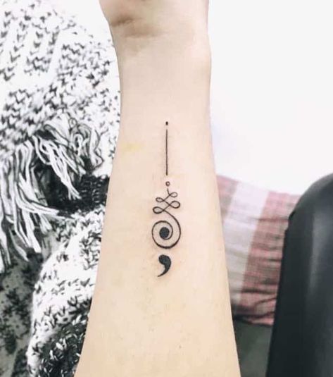 an unalome buddist tattoo with a semicolon by @natattoostudio  - Empowering Semicolon Tattoos To Carry On The Hope Of Life - OurMindfulLife.com Semicolon Wrist Tattoo, Colon Tattoo, Small Arrow Tattoos, Buddhist Tattoo, Semi Colon, Health Tattoo, Petit Tattoo, Unalome Tattoo, Semicolon Tattoo