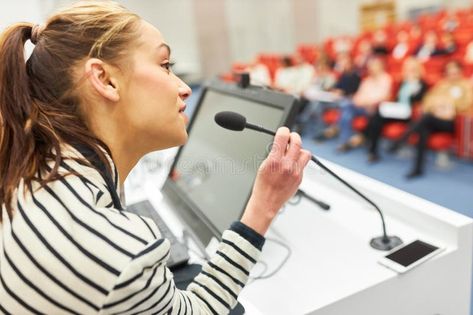 Orator giving speech on stage in convention center royalty free stock images Female Speaker, Giving Speech, The Orator, Convention Center, Convention Centre, On Stage, Stock Images Free, Speaker, Coaching