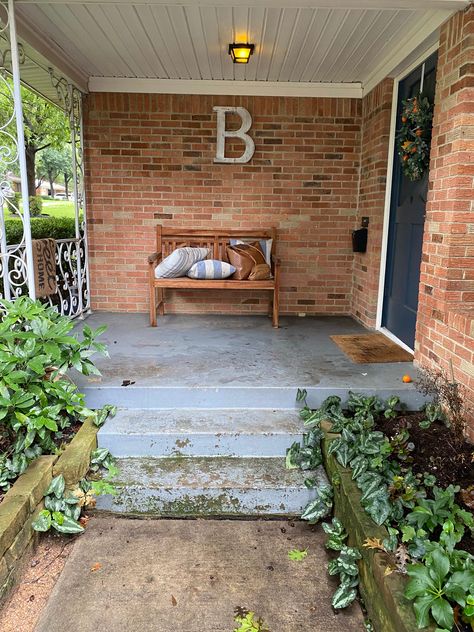 How to Update Your Patio: Covering Concrete Steps with Wood Concrete Porch Steps Ideas, Covering A Concrete Porch, Update Porch, Concrete Back Porch Ideas, Cover Concrete Porch, Wood On Concrete Porch, Concrete Porch Paint Ideas Floor Colors, Cement Porch Ideas Front Steps, Concrete Porch Cover Up Ideas