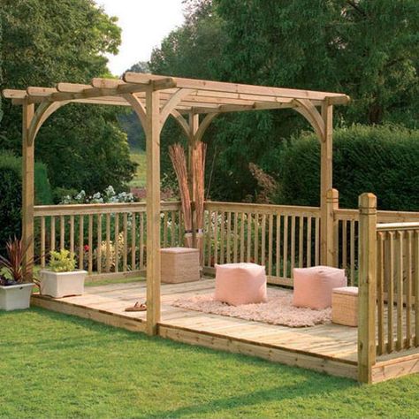 Try a freestanding kit such as this one and create a secluded, multifunctional area at the bottom of your garden. The inclusion of a pergola will give your garden structure and another focal point, while providing support for climbing plants and an attractive canopy to sit under when the plants are in flower. Floating Deck Plans, Freestanding Deck, Garden Decking, White Pergola, Decking Area, Wooden Gazebo, Building A Pergola, Pergola Design, Pergola Canopy