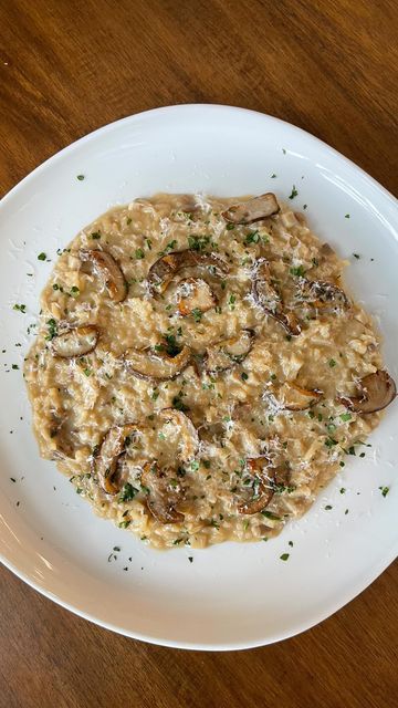 Alex Trim on Instagram: "Porcini risotto….. Recipe down below 8oz fresh porcini (stems diced, caps sliced) 1 shallot finely diced 1 cup acquerello or Arborio rice 2 quarts vegetable/chicken stock 2oz dried porcini Fresh picked thyme Diced good quality butter EVOO Parmesan Parsley garnish -Make porcini stock by adding dry mushrooms to simmering stock, let steep 30 minutes. Strain mushrooms and chop. -Sauté shallot in 1.5Tbsp EVOO until translucent. -Add rice, stir to coat evenly. Cook until rice is fragrant and lightly toasted. -Add wine, cook until almost completely dry. -Add 1 ladle of the porcini stock at a time, stirring almost constantly. Cook until the stock is almost completely dry, then add another ladle and repeat. -Once rice is almost completely cooked, add a saute pan to heat o Porcini Risotto, Dry Mushrooms, Risotto Recipe, Arborio Rice, Dried Mushrooms, Italian Cooking, Main Courses, Chicken Stock, Shallots