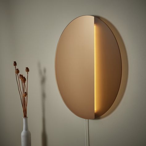 IKEA and Sabine Marcelis bring warmth to light with VARMBLIXT Led Wall Mirror, Statement Lamp, Ikea Finds, Tinted Mirror, Led Wand, Mirror Lamp, Dimmable Lamp, Metal Lamp, Luz Natural