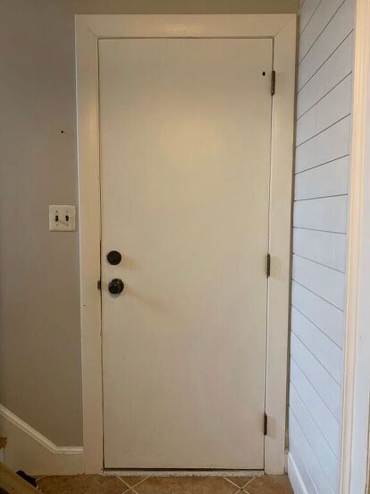 See how she gave her old plain interior door an update for cheap with this quick DIY door upgrade. How to add trim to interior door. Update Plain Interior Doors, How To Update Plain Interior Doors, How To Refinish Old Wood Doors, Dyi Doors And Trim Paint Infoor, Change Regular Door To Barn Door, Door Paintings, Door Remodel, Farmhouse Trim, Slab Doors