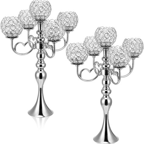 PRICES MAY VARY. Elegant and Luxurious Design: our 5 arm crystal candelabras come with hollow designs, crystal candle holder bowls are interspersed with the silver candlestick body, decorated with delicate heart shaped support arms for luxurious look, which can add brilliance and charm to your table and can easily grab your guests' attention Proper Size: the crystal candelabra centerpieces measure about 21.5 inches high overall, and each candle holder bowl is about 2.8 inches in opening diameter Wedding Anniversary Dinner Party, Anniversary Dinner Party, Wedding Anniversary Dinner, Bling Centerpiece, Candelabra Centerpieces, Tall Candle Holder, Silver Candelabra, Candelabra Centerpiece, Diamond Centerpiece