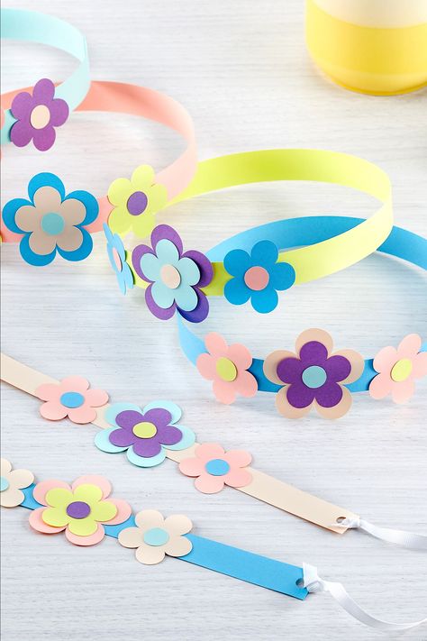 Blossom into crafting royalty this summer by creating this adorable paper flower crown. This is the perfect craft to try out with kids at home or in the classroom. To create it, gather up your supplies: your favorite colors of Astrodesigns Cardstock (We recommend the Astrodesigns Blooms & Blossoms Cardstock!), scissors, and glue. Start the crafting adventure by snagging Astrodesigns Blooms & Blossoms Cardstock at Amazon and downloading the free template at the link. *Difficulty: Easy* Kids Crown Craft, Flower Crown For Kids, Paper Crowns For Kids, Crown Crafts For Kids, April Crafts For Kids, Flower Crown Craft, Mother's Day Crafts For Preschoolers, Flowers Craft Ideas, Kids Paper Crafts