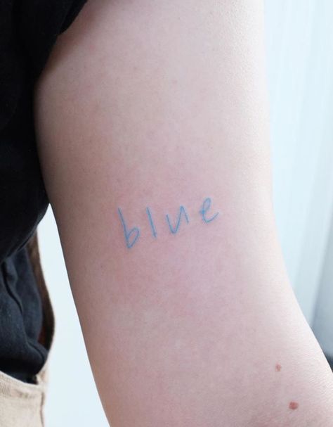 Blue Aesthetic Tattoo, Word Blue Tattoo, Light Blue Tattoo Ink, Tiny Blue Tattoo, Light Blue Ink Tattoo, Blue Word Tattoo, Blue Ink Tattoo Words, Pastel Tattoo Ideas, Small Blue Tattoo