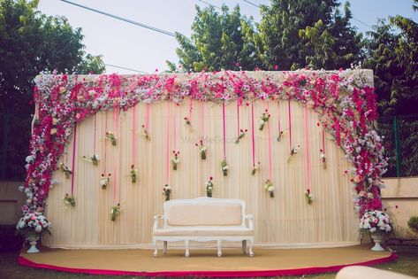 Photo of Unique engagement stage decor idea with florals in hanging bottles Engagement Stage Decor, Engagement Decorations Indian, Hanging Bottles, Engagement Stage, Indian Wedding Decorations Receptions, Engagement Stage Decoration, Reception Stage, Reception Stage Decor, Simple Stage Decorations