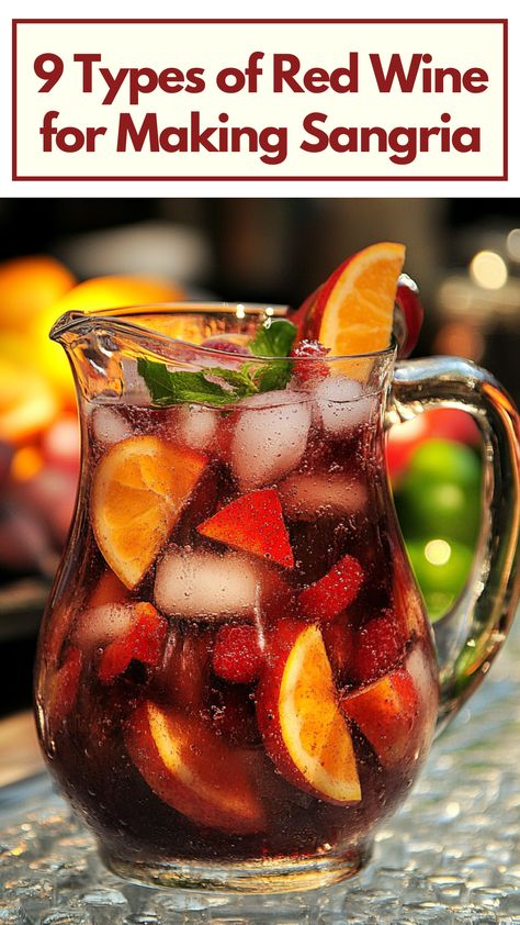 A glass pitcher of sangria made with red wine, filled with fruit slices and served with ice, perfect for a refreshing summer drink. Best Red Wine For Sangria, Basic Sangria Recipe, Best Wine For Sangria, Red Sangria Recipes, Types Of Red Wine, How To Make Sangria, Red Wine Sangria, Rioja Wine, White Zinfandel