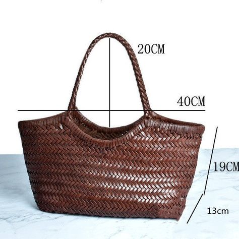 Introducing Harper, our exquisitely designed woven leather tote bag, perfect for combining style and functionality. Crafted from high-quality leather, Harper is available in a range of sophisticated colors: white, black, milk tea, and light brown. The trendy woven style gives Harper a unique appearance, making it a standout accessory for your market shopping. Inside, the bag features a zipper pocket, mobile phone bag, and certificate bag, ensuring that your essentials are secure and easily... Premium Leather Handbags, Luxe Handbags, Woven Leather Tote, Mobile Phone Bag, Market Shopping, Leather Tote Bag, Light Brown, High Quality Leather, Zipper Pocket