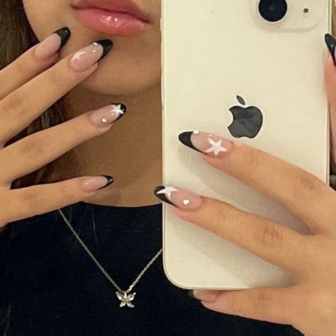 star nail inspo ★ Almond Shape French Tip Nails With Rhinestones, Black And White Star Acrylic Nails, Black Star Almond Nails, Black Almond Nails With Gems, Black French Tip With White Stars, Nail Ideas Y2k Short Black, Black French Tip Star Nails, Star Nails With Gems, Black French With Stars