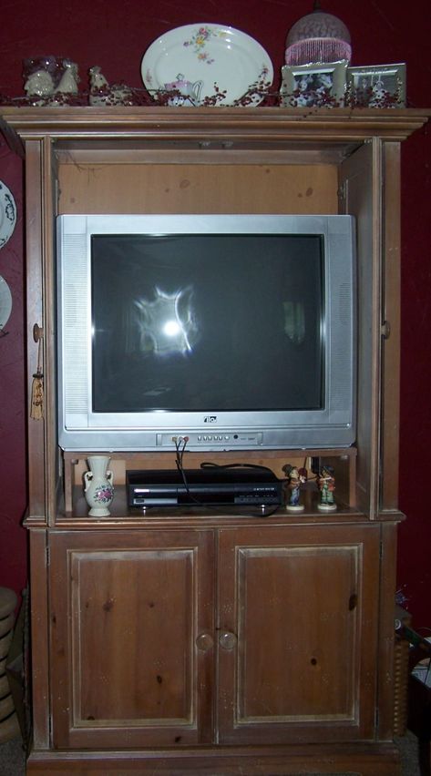 What To Do With An Old Armoire or TV Cabinet. Repurpose. | HubPages Repurposing Entertainment Center Ideas, Tv Armoire Repurposed, Tv Stand Upcycle, Tv Cabinet Repurpose, Armoire Decor, Armoire Repurpose, Small Tv Cabinet, Old Tv Stands, Old Entertainment Centers