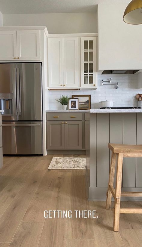 Mushroom Color Kitchen Island, Cool Toned Kitchen Ideas, Two Town Kitchen Cabinets, Two Tone Kitchen Cabinets Paint, Kitchen Living Room Colors, Kitchen Cabinet Color Ideas Neutral, Kitchen Stock Cabinets, Tri Color Kitchen, White Top Cabinets Beige Lower