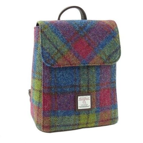 100% Pure new wool hand Woven by Islanders in the Outer Hebrides of Scotland. Stylish Harris Tweed backpack designed with an accessible zip pocket on the back. Inside the backpack there is also an open pocket making it perfect for everyday use. Multi Color check Harris Tweed wool with Brown PU Leather straps and trim. Dimensions: 10" x 9" x 5" FREE Shipping to USA Tweed Backpack, Outlander Style, Tweed Outer, Harris Tweed Fabric, Plaid Backpack, Outer Hebrides, Tweed Fabric, Harris Tweed, Small Shoulder Bag