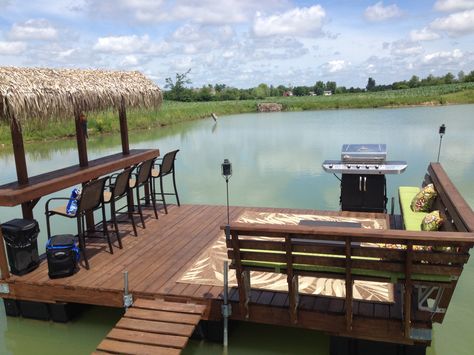 Floating dock tiki bar on our pond Dock Bar Ideas, Dock Ideas Lakeside, Pond Docks, Pier Ideas, Dock Decor, Docks On The Lake, Pond Dock, Lake Bar, Floating Pontoon Dock